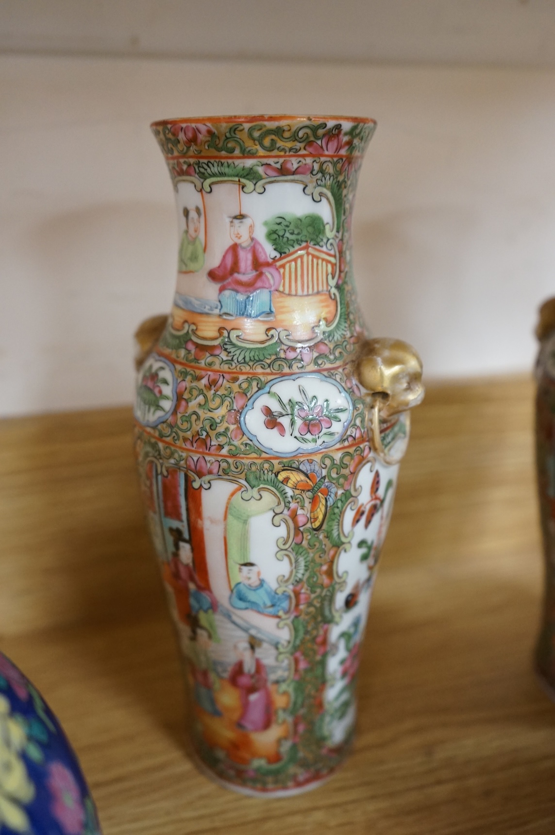 Fourteen pieces of Chinese porcelain and pottery, 19th/20th century to include a pair of blue and white ginger jars, famille rose cup and saucer and a cloisonné pot and cover in the form of an apple, largest 27cm high